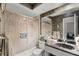 Retro bathroom featuring a shower-tub combo and dark granite sink counter at 6301 Parson Brown Dr, Orlando, FL 32819