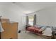 Bedroom featuring a bed, window and closet at 6301 Parson Brown Dr, Orlando, FL 32819