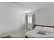 Bedroom featuring a bed with white linens, a window, and a closet at 6301 Parson Brown Dr, Orlando, FL 32819