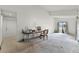 Bright living space offering neutral carpet, ample sunlight, and vaulted ceilings at 6301 Parson Brown Dr, Orlando, FL 32819