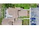 Aerial view of townhomes with neatly kept landscaping and private parking at 750 Olympic Cir # D1, Ocoee, FL 34761