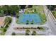 Aerial view of two community tennis courts at 750 Olympic Cir # D1, Ocoee, FL 34761