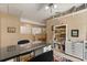 Bonus room with storage and desk area, featuring built in shelves, and natural light at 901 Grovesmere Loop, Ocoee, FL 34761
