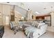 Open-concept living area seamlessly connects to the kitchen, with contemporary furnishings and decor at 901 Grovesmere Loop, Ocoee, FL 34761