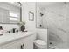 Modern bathroom featuring marble tile shower with black hardware and updated vanity at 955 Tomes Ct, Orlando, FL 32825