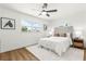 Bright bedroom with a queen-size bed and natural light at 955 Tomes Ct, Orlando, FL 32825
