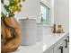 Close-up of a counter featuring a vase and containers at 955 Tomes Ct, Orlando, FL 32825