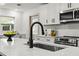 Well-lit kitchen with modern fixtures and updated appliances at 955 Tomes Ct, Orlando, FL 32825