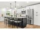 Modern kitchen with stainless steel appliances and a view of the backyard at 955 Tomes Ct, Orlando, FL 32825