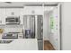 Well-appointed kitchen with stainless steel appliances and a pantry at 955 Tomes Ct, Orlando, FL 32825