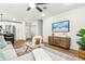 Comfortable living space featuring updated appliances, decor and flooring at 955 Tomes Ct, Orlando, FL 32825