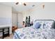 This bright bedroom offers plenty of natural light, a comfy bed, and ample closet space at 9978 Mere Pkwy, Orlando, FL 32832