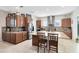 Spacious kitchen featuring stainless steel appliances, granite countertops, and ample cabinet space at 9978 Mere Pkwy, Orlando, FL 32832