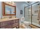 Stylish bathroom with a vanity, framed mirror, and walk-in shower at 339 Carolyn Dr, Oviedo, FL 32765