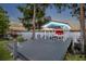 Scenic boat dock with a boat lift on the lake, ideal for evening cruises and water activities at 339 Carolyn Dr, Oviedo, FL 32765