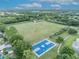 Community park showcasing basketball courts, green space and mature trees, great for outdoor activities at 339 Carolyn Dr, Oviedo, FL 32765