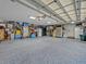 Spacious three-car garage with epoxy flooring, providing ample parking and storage space at 339 Carolyn Dr, Oviedo, FL 32765