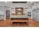 Open kitchen featuring a center island with seating, custom cabinets, and luxury appliances at 339 Carolyn Dr, Oviedo, FL 32765