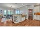 Charming kitchen with wood floors, granite countertops, and stainless steel appliances at 339 Carolyn Dr, Oviedo, FL 32765