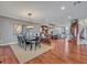 Open floor plan connecting the dining room, kitchen, and staircase at 339 Carolyn Dr, Oviedo, FL 32765