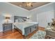 Comfortable main bedroom featuring hardwood floors and modern finishes at 339 Carolyn Dr, Oviedo, FL 32765
