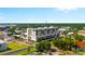 Aerial view of the house and the surrounding neighborhood, showing a central urban area at 111 E Monument Ave # 801, Kissimmee, FL 34741