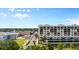 Stylish building exterior with large windows and lush landscaping and vibrant city view at 111 E Monument Ave # 801, Kissimmee, FL 34741