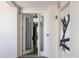 Welcoming hallway featuring a modern design, unit number, and decorative artwork at 111 E Monument Ave # 801, Kissimmee, FL 34741