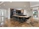 Open concept kitchen featuring modern appliances, a spacious island, and stylish cabinetry at 111 E Monument Ave # 801, Kissimmee, FL 34741