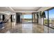 Bright living room with floor-to-ceiling windows showcasing stunning city views at 111 E Monument Ave # 801, Kissimmee, FL 34741