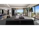 Open living room featuring floor-to-ceiling windows and a spacious balcony with a view at 111 E Monument Ave # 801, Kissimmee, FL 34741
