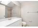 Bathroom featuring a white vanity and walk-in shower at 11715 Sindlesham Ct, Orlando, FL 32837