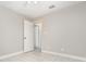 Bedroom featuring tile floors, overhead fan, and doorway at 11715 Sindlesham Ct, Orlando, FL 32837