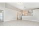 Spacious living room with tile flooring, neutral walls, and an open layout at 11715 Sindlesham Ct, Orlando, FL 32837
