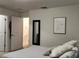 Bedroom featuring a bed and a view into the hallway and closet space at 11802 Pulitzer Pl, Orlando, FL 32832