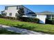 Beautiful landscaping on a green lawn with manicured shrubs and a privacy fence at 11802 Pulitzer Pl, Orlando, FL 32832