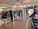 Community gym with treadmills, weight machines, and free weights for residents at 11802 Pulitzer Pl, Orlando, FL 32832