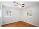 Cozy bedroom offering hardwood floors, fresh paint, and bright, natural light at 1322 Morris Ave, Orlando, FL 32803
