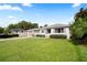 Well-manicured front lawn leads up to this lovely single-story home at 1322 Morris Ave, Orlando, FL 32803