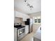 Kitchen features stainless steel appliances, modern countertops, and ample cabinet space at 1322 Morris Ave, Orlando, FL 32803