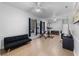 Spacious home gym with workout equipment, desk and seating area provides a great exercise space at 13478 Summer Rain Dr, Orlando, FL 32828