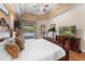 Bright bedroom boasts hardwood floors, a view of the pool, and modern amenities for comfortable living at 13478 Summer Rain Dr, Orlando, FL 32828