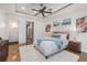 Comfortable bedroom features a tray ceiling, warm colors, and ample natural light at 1350 Lyndale Blvd, Winter Park, FL 32789