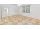 Spacious bedroom featuring tile flooring and a walk-in closet provides plenty of storage at 1350 Lyndale Blvd, Winter Park, FL 32789
