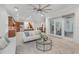 Open concept living area seamlessly connects the kitchen and dining spaces with access to the outdoors at 1350 Lyndale Blvd, Winter Park, FL 32789
