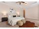 Cozy bedroom boasts a ceiling fan, plush carpet and neutral decor at 140 E Morse Blvd # C, Winter Park, FL 32789