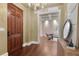 Inviting entryway features hardwood floors and a view into the light-filled living spaces at 140 E Morse Blvd # C, Winter Park, FL 32789