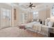 Spacious main bedroom featuring a ceiling fan, neutral tones, and a balcony with lots of natural light at 140 E Morse Blvd # C, Winter Park, FL 32789