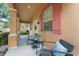 Inviting front porch with comfortable seating and decorative accents at 14897 Evergreen Oak Loop, Winter Garden, FL 34787