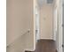 Hallway featuring doors and view into other rooms of the house at 14897 Evergreen Oak Loop, Winter Garden, FL 34787